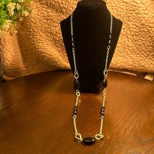 Long silver tone chain & black bead necklace